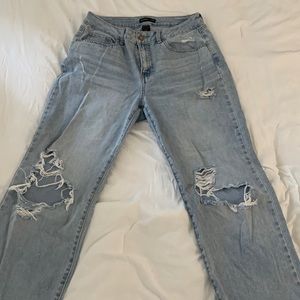 Light blue, mid-rise ripped jean